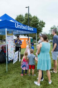 Face painting by United Bank at 2023 Warm Up 
